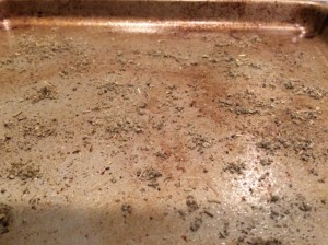 Sprinkled sage on a greased cookie sheet for toffee.